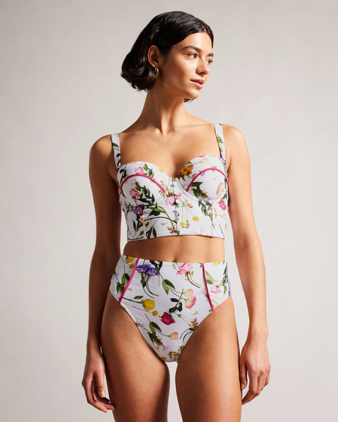 ROSABY-Swimwear-Flirty and little retro, the ROSABY bikini bottom is the ideal swimwear addition to your summer wardrobe. It's made with a soft stretch fabric and features contouring details along the front to flatter your shape. Wear it with the matching top to create a look that's perfect for lounging poolside.The fabric of this product is made with 78% recycled polyamide. Using recycled polyamide helps divert plastic waste from ending in landfills. Bikini bottoms Scattered bouquet print High waisted Cont